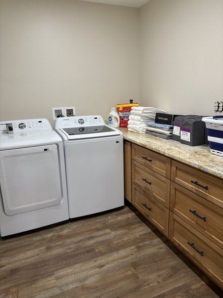 Laundry room with washer and dryer